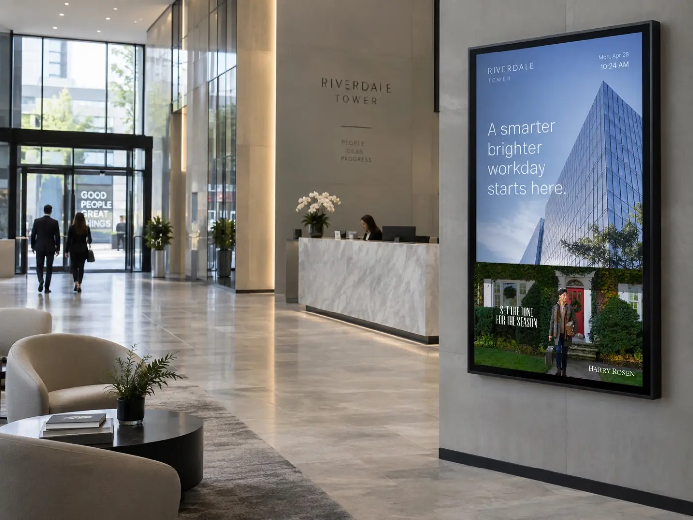 Emplace screen in a marble office tower lobby showing Harry Rosen ad